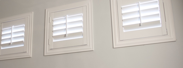 Square Windows in a Virginia Beach Garage with Plantation Shutters